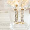 Pendientes de clip con incrustaciones de circonita y hebilla de cuatro garras con diseño de nicho a la moda que no se decoloran, joyería de moda coreana