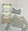 Camiseta Listrada Longa Solta para Mulheres, Top Versátil e Juvenil para a Primavera de 2026, Tendência de Camiseta Básica Fashion