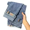 Jeans para hombre, nuevo estilo primavera y otoño, versátiles y modernos, de pierna recta ajustada elástica, pantalones largos estampados en gris ceniza, pantalones casuales de alta elasticidad