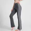 Pantalones de yoga de cintura alta, que realzan las caderas, ligeramente acampanados, con efecto adelgazante, con rayas verticales en contraste, diseñados para fitness y deportes, disponibles en tallas grandes para mujer, con pierna ligeramente acampanada
