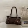 Bolso de mujer mate retro simple, nuevo modelo 2026, bolso cruzado versátil para el día a día, bolso de hombro a la axila de moda, bolso baguette