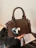 Bolso Boston de Alta Gama para Viajes Cotidianos, Bolso de Hombro Cruzado de Moda para Mujer, Nuevo Bolso de Mano Retro de Nicho Otoño e Invierno 2025