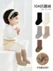 Calcetines para Bebé 2026 Invierno Nuevo Estilo Felpa Engrosados Sin Costuras No Constrictivos Color Sólido Calcetines de Media Pantorrilla para Recién Nacido