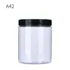 Frasco de plástico alimentario de fábrica transparente té perfumado fruta seca caramelo sellado botella de plástico PET de boca ancha cubo de plástico para galletas