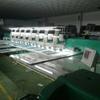 Dongguan Máquina de bordado acolchado de segunda mano máquina todo en uno de bordado perforado máquina perforadora de cuero bordado multijefe venta al por mayor