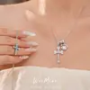 Collar con cruz en forma de corazón adornada con circonitas, cadena para clavícula de lujo ligero de nicho, único y elegante con un toque de alta gama, venta al por mayor