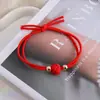 Cuerda para la cabeza de Año Nuevo Roja Estilo Étnico Cuerda para el pelo Trenzada Cuerda de mano Alta Elasticidad Duradera Cinta para el pelo de Año Nuevo Banda de goma