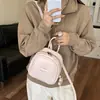 Mini mochila casual y simple para mujer, nuevo modelo 2026, bolso casual de alta gama con doble hombro para el uso diario y salidas
