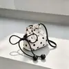 Bolso Cubo con Cordón de Lunares Diseño de Nicho Estilo Coreano para Mujer 2026 Nuevo Bolso de Viaje Bolso de Hombro Cruzado