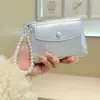 Daini Versión Coreana Nuevo Patrón Agrietado Color Sólido Simple Colgante de Lazo de Perla 80% de descuento Cierre de Cremallera Cartera Corta