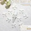 Ins Celebridad de Internet popular resina joyería para uñas al por mayor cinta de color lazo diy corbata de lazo tridimensional accesorios para uñas
