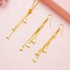 Moda de lujo ligero aretes de borla de mariposa dorada traje collar de clavícula de oro de imitación nuevo para mujer venta caliente transfronteriza