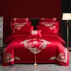 Nuevo conjunto de boda de cuatro piezas 100% algodón bordado 2026, con un diseño lujoso y elegante de algodón de fibra larga, en estilo chino tradicional y color rojo vibrante para bodas