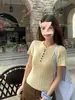 Prenda Exterior de Punto de Manga Corta 2026 Nuevo Verano Ajustada Camiseta Blanca para Mujer Ropa de Principios de Primavera Estilo Coreano Top Talla Única