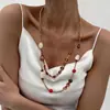 Colar de cristal acrílico com contas transfronteiriço europeu e americano, apresentando um estilo retrô Melard, uma corrente para suéter leve e luxuosa, e um design de alta qualidade para mulheres