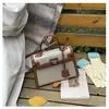 Bolsos estilo nuevo candado bolso Kelly, bolso de mano de moda europeo y americano con bloques de color para mujer, bolso cruzado de hombro texturizado y empalmado