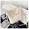 Bolso tipo cubo popular con textura de celebridad de internet para mujer 2024 nuevo moderno a la moda estilo occidental todo lo combina bandolera de hombro para mujer
