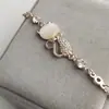 A nova versão coreana da pulseira de gato liga de diamante joia de moda requintada pulseira atacado