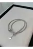 Collar de Perlas Shijia Perfectamente Redondas y de Alto Brillo con un Estilo Trendy de Influencer, Presentando un Diseño Único y una Cadena de Clavícula a la Moda
