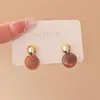 Pendientes Elegantes Redondos Manchados Maillard Estilo Hong Kong para Mujer Nuevos 2024 Pendientes Explosivos Otoño e Invierno Pendientes de Lujo Ligero de Alta Gama