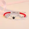Un ciervo tiene tu pulsera de pareja de proyección 100 idiomas versión coreana de joyería simple pulsera de cuerda roja con pequeñas astas