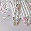 Cadena para teléfono móvil estilo Ins Versátil Lanyard colgante para funda de teléfono móvil para mujer Anti-caída Lanyard corto Ccd Cadena colgante de dopamina