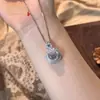 Pingente Natural de Jade Gelo Alto Feijão Fu Inlaid com Ovo de Pombo Novo Estilo Chinês Temperamento de Luxo Leve Banhado a Prata Inlaid com Buda