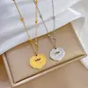 [Cuerpo entero de acero de titanio] Collar de oro real de estilo minimalista con cerradura Xiangyun con personaje Fu en horno para mujer, accesorios de cadena de clavícula de celebridades de Internet