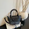 Bolso Cubo Popular de Moda 2026 Nuevo Estilo Moderno Elegante Versátil Alta Apariencia Pequeño Bolso de Mano para Llevar Bolso de Hombro de Gran Capacidad