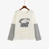 Suéter de punto a rayas con estampado de gatito de dibujos animados para mujer de talla grande, estilo otoño 2026 para mujeres de talla grande, top casual de imitación de dos piezas 25106
