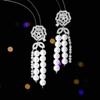 Luxo leve de alta qualidade elegante banquete de casamento brincos de noiva moderno longo oco Camellia Pearl tassel brincos