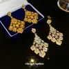 Pendientes de gota con incrustaciones de diamantes estilo corte europeo y americano para mujer, pendientes de lujo ligero y de alta gama para fiestas, cenas y novias