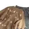 Ropa infantil coreana, camiseta de manga larga para niño, diseño de estilo callejero de otoño, top de imitación de dos piezas, camiseta infantil
