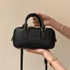 Suministro de Guangzhou Miu Bowling Bolso de Cuero para Mujer Bolso Boston de Gama Alta Bolso de Hombro Cruzado Tipo Almohada