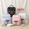 Nueva bolsa de mamá transfronteriza de gran capacidad, aislamiento de papel de aluminio, resistente al agua, bolsa para bebé multipropósito para viajar con niños