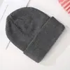 Gorros de lana personalizados de otoño e invierno transfronterizos, unisex, modernos y cálidos, gorros de punto simples y versátiles