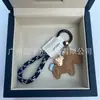 Dinero en el Caballo Cuero de Vaca Creativo Exquisito Casual Regalo de Pareja Bolso Lindo Colgante Llavero de Coche Llavero