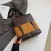 Mochila de Bloques de Color Nueva para Otoño e Invierno 2026 Gran Capacidad Moda Casual Bolso Retro Multiusos Versátil