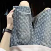 Shorts de Mezclilla Jacquard Azules para Hombre Verano 2025 Nuevo Diseño Rasgados de Cuatro-Cinco Minutos de Largo Pantalones Casuales Sueltos de Longitud Media