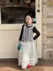 Otoño 2026 Nuevo Estilo Coreano Ropa Infantil Niñas Tops en Capas Chaleco con Patrón de Malla Camiseta de Manga Larga Falda de Pastel