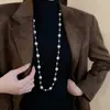 Nuevo collar de perlas artificiales de doble capa, cadena para la clavícula de moda exquisita transfronteriza, cadena de suéter de lujo ligero estilo francés