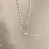 Collar de perlas de temperamento con diseño de moda coreana, colgante de amor conmovedor de Yuji, cadena de clavícula de viento frío