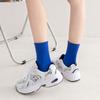 Venta directa de fábrica de calcetines de primavera con explosiones de colores sólidos japoneses de color caramelo para mujer, calcetines de colores de marea, venta al por mayor