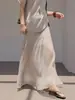 Elegância delicada, saia de tricô de lã Merino de 16 pontos, habilmente trabalhada, com organza sobreposta, saia leve estilo sereia francesa