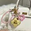 Nuevo llavero de trébol de cuatro hojas para la buena suerte y la riqueza, accesorio de regalo de dibujos animados creativo para bolsos