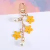 Llavero Colgante Ins de Goteo de Aceite de Doble Cara Transfronterizo Flor Colorida Accesorios de Aleación Perla Decoración para Funda de Auriculares Bolsa