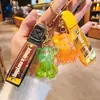 Llavero de oso luminoso de acrílico de gelatina de moda roja, lindo colgante para mochila de pareja, regalo pequeño para máquina de garra, venta al por mayor