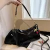 Bolsa de ombro brilhante popular 2026 novo modelo bolsa de ombro simples bolsa de mão versátil da moda bolsa transpassada moderna para mulheres
