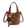 Bolsa Saco Feminina 2025 Pequena Tote Bag Bolsa de Ombro Transversal Estilosa Versátil Moda para o Dia a Dia Textura Simples