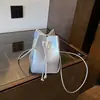 Nova Mini Bolsa de Palha Tecida com Cordão 2025 Design de Nicho Feminino Bolsa Tecida Bolsa para Celular Bolsa de Ombro Transversal